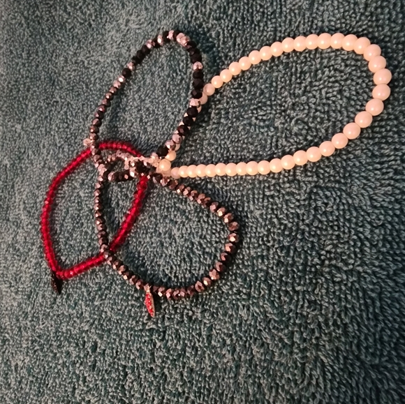 4 piece stretch bracelets white black and red. New in packaging Origami Owl - Picture 3 of 3
